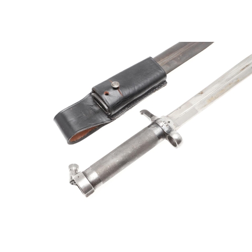 139 - A SWEDISH M.1896 PATTERN BAYONET AND SCABBARD. With a 21cm pointed blade with central shallow fuller... 