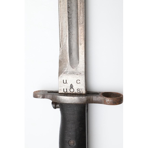 140 - AN AMERICAN 1903 PATTERN BAYONET AND SCABBARD. With a 25cm pointed single edged blade with broad ful... 