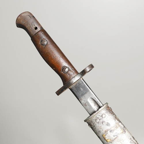 143 - A 1907 LEE ENFIELD BAYONET AND SCABBARD. With a 43cm pointed, single edged and fullered blade marked... 