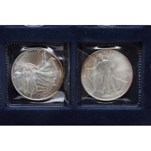 978 - A COLLECTION OF TWELVE RECENT AMERICAN LIBERTY DOLLARS. American Liberty Dollars, 1oz fine silver: 1... 