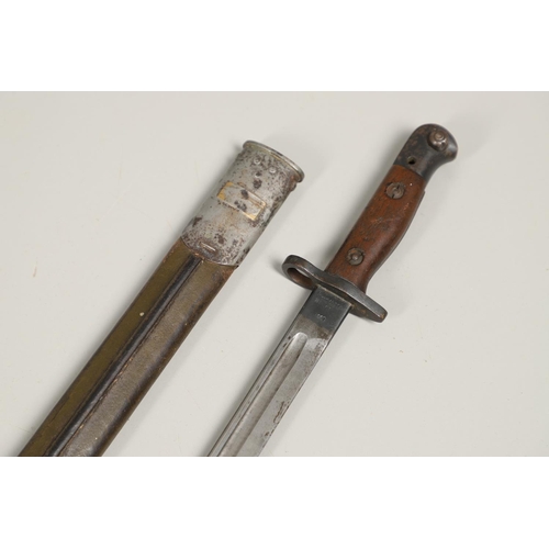 143 - A 1907 LEE ENFIELD BAYONET AND SCABBARD. With a 43cm pointed, single edged and fullered blade marked... 