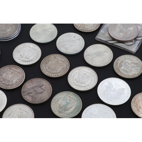 980 - A COLLECTION OF AMERICAN SILVER DOLLARS AND OTHER COINS. A collection of silver dollars: 1881, 1882,... 