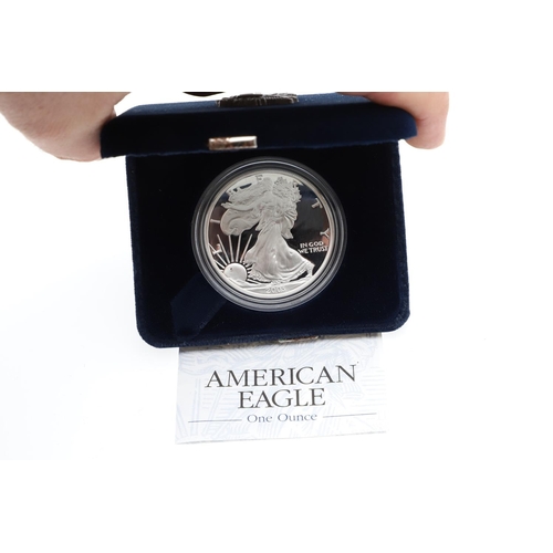 981 - THREE PRESENTATION PROOF AMERICAN EAGLE COINS AND OTHERS. Three American Eagle one ounce silver bull... 