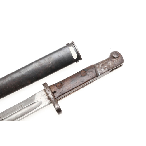 145 - A FIRST WORLD WAR 1907 PATTERN BAYONET AND SCABBARD. With a 25cm pointed single edged fullered blade... 