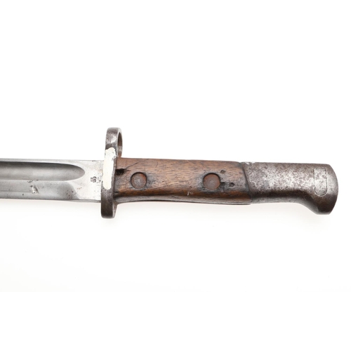 145 - A FIRST WORLD WAR 1907 PATTERN BAYONET AND SCABBARD. With a 25cm pointed single edged fullered blade... 