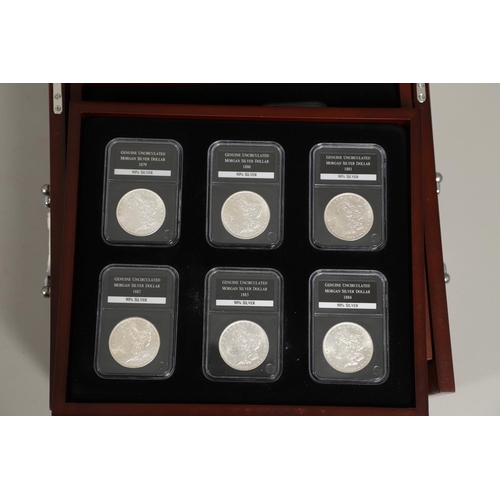 983 - A PRESENTATION COLLECTION OF TWENTY EIGHT DOLLARS. A presentation collection of slabbed American Dol... 