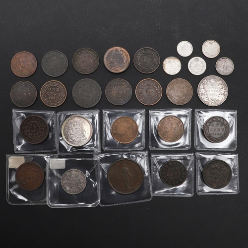 984 - A COLLECTION OF VICTORIAN AND LATER CANADIAN COINS. Canadian coins: 50 Cents: 1906, 1965. 25 cents 1... 