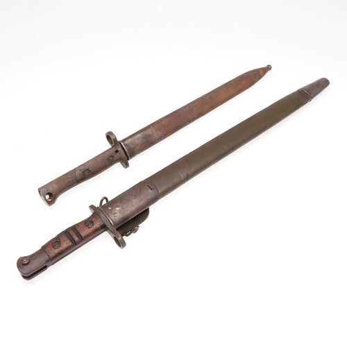 151 - A FIRST WORLD WAR REMINGTON 1913 PATTERN BAYONET AND SCABBARD. With a 43cm pointed and fullered sing... 