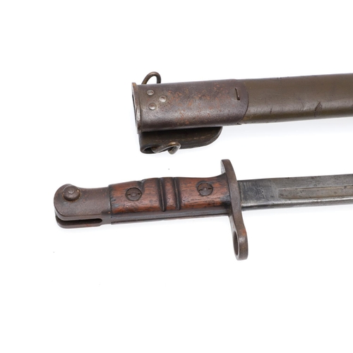 151 - A FIRST WORLD WAR REMINGTON 1913 PATTERN BAYONET AND SCABBARD. With a 43cm pointed and fullered sing... 