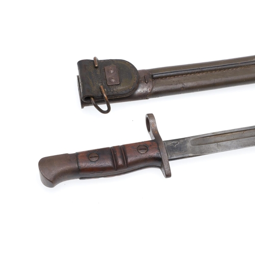 151 - A FIRST WORLD WAR REMINGTON 1913 PATTERN BAYONET AND SCABBARD. With a 43cm pointed and fullered sing... 