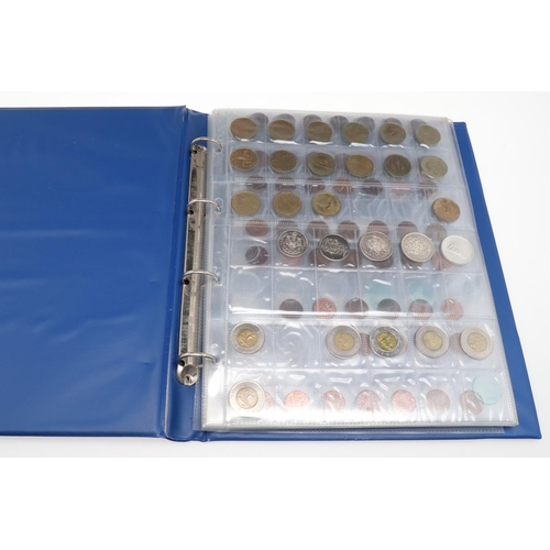 993 - AN EXTENSIVE ALBUM OF GEORGE VI AND LATER CANADIAN COINS. A thorough collection of Canadian coins, G... 