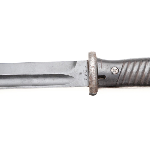 156 - A SECOND WORLD WAR GERMAN MAUSER K98 BAYONET AND SCABBARD. With a 25cm pointed single edged blade wi... 