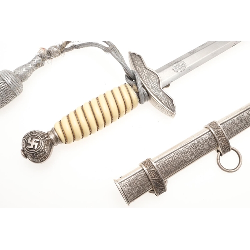 166 - A SECOND WORLD WAR GERMAN LUFTWAFFE OFFICER's  DAGGER AND SCABBARD. A 2nd pattern Luftwaffe dagger w... 