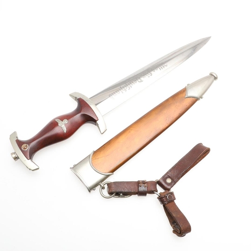168 - A SECOND WORLD WAR GERMAN SA DAGGER AND SCABBARD. With a 22cm double edged, pointed blade etched 'Al... 