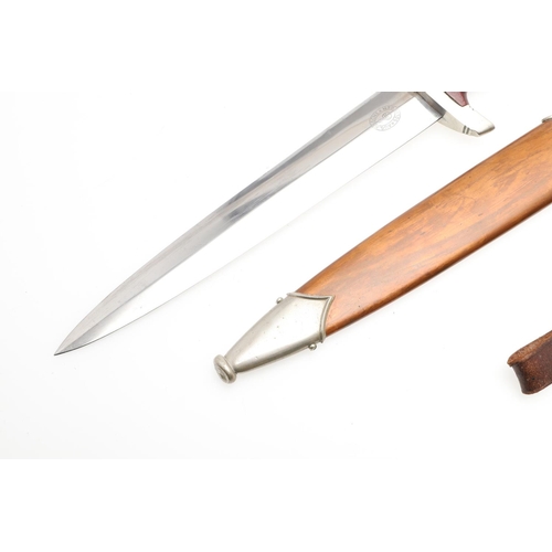 168 - A SECOND WORLD WAR GERMAN SA DAGGER AND SCABBARD. With a 22cm double edged, pointed blade etched 'Al... 