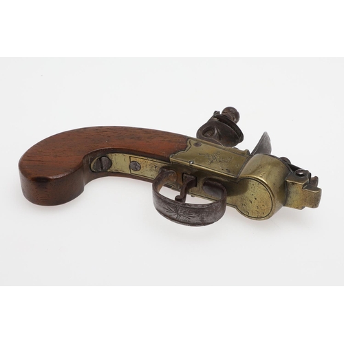 17 - A BRASS FLINTLOCK POCKET TINDER LIGHTER. A pocket flintlock tinder lighter, the brass action engrave... 