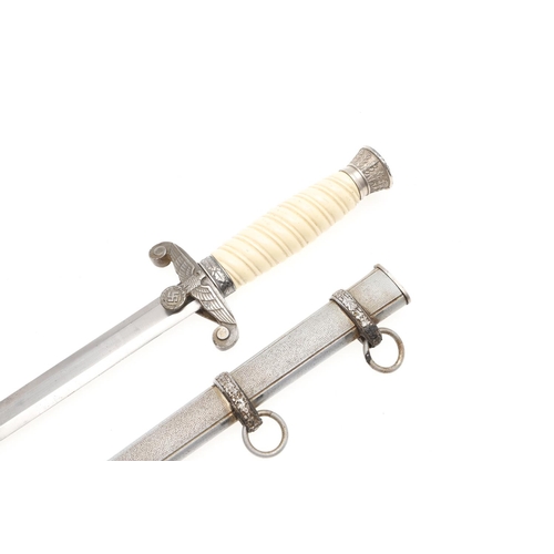 172 - A SECOND WORLD WAR GERMAN ARMY DAGGER AND SCABBARD. With a 25cm tapering and pointed blade marked fo... 