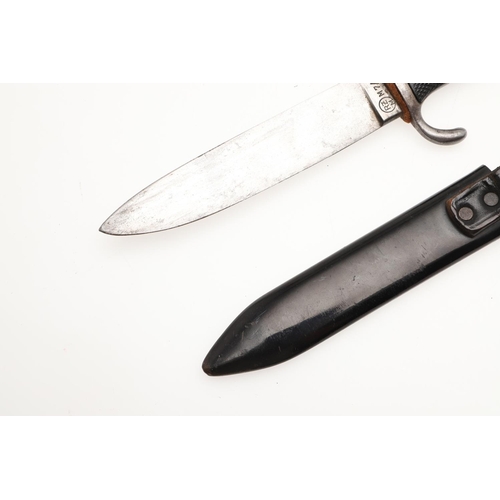 173 - A GERMAN HITLER YOUTH DAGGER AND SCABBARD. A Hitler Youth dagger with a 13.5cm blade marked RZM M7/5... 