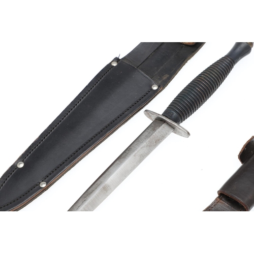 177 - TWO THIRD PATTERN FAIRBAIRN-SYKES FIGHTING KNIVES. With a 17cm pointed double sided blade, straight ... 