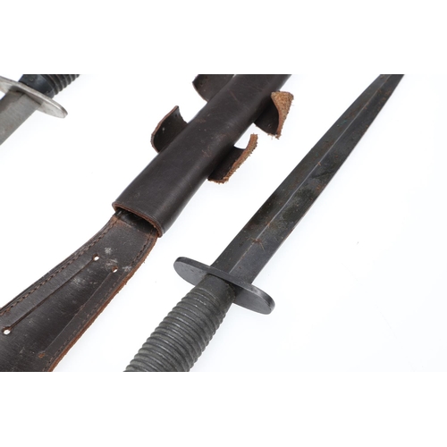 177 - TWO THIRD PATTERN FAIRBAIRN-SYKES FIGHTING KNIVES. With a 17cm pointed double sided blade, straight ... 