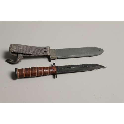 179 - AN AMERICAN MK2 FIGHTING KNIFE AND TWO OTHERS. A Camillus N.Y. U.S.N Mark 2 knife with a 17.5 cm bow... 