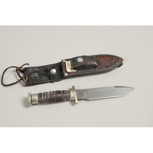 179 - AN AMERICAN MK2 FIGHTING KNIFE AND TWO OTHERS. A Camillus N.Y. U.S.N Mark 2 knife with a 17.5 cm bow... 