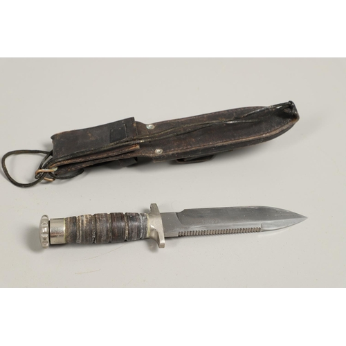 179 - AN AMERICAN MK2 FIGHTING KNIFE AND TWO OTHERS. A Camillus N.Y. U.S.N Mark 2 knife with a 17.5 cm bow... 