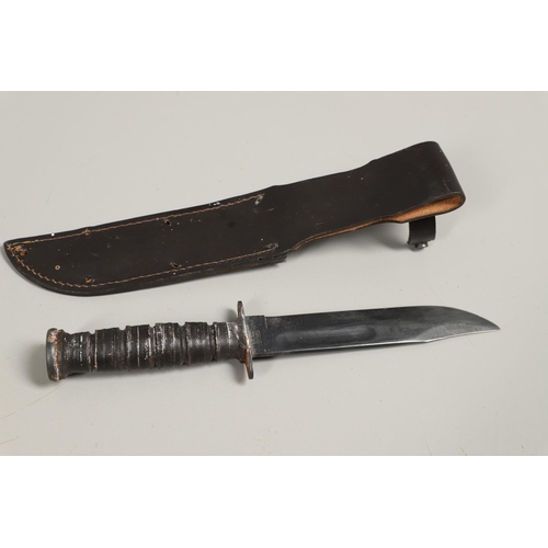 179 - AN AMERICAN MK2 FIGHTING KNIFE AND TWO OTHERS. A Camillus N.Y. U.S.N Mark 2 knife with a 17.5 cm bow... 