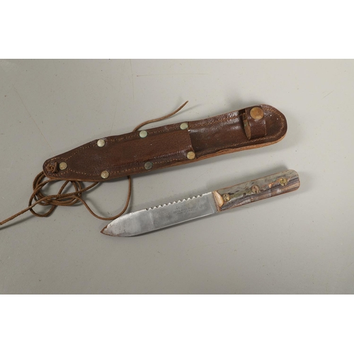 182 - AN AMERICAN CASE HUNTING KNIFE AND THREE OTHERS. A Case hunting knife with a 24cm plated Bowie type ... 