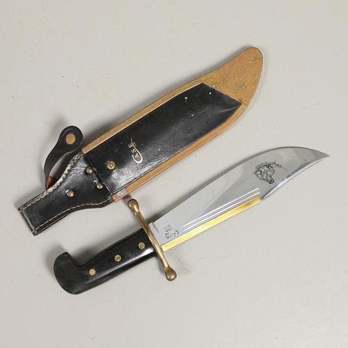 182 - AN AMERICAN CASE HUNTING KNIFE AND THREE OTHERS. A Case hunting knife with a 24cm plated Bowie type ... 