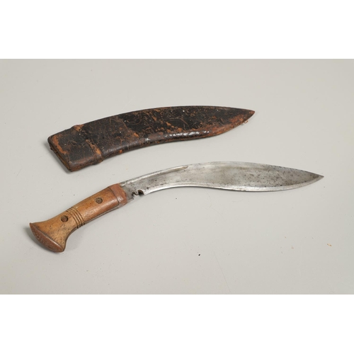 190 - TWO SIMILAR KUKRI KNIVES AND SCABBARDS. A Kukri knife with a shaped 30cm blade with pricked decorati... 