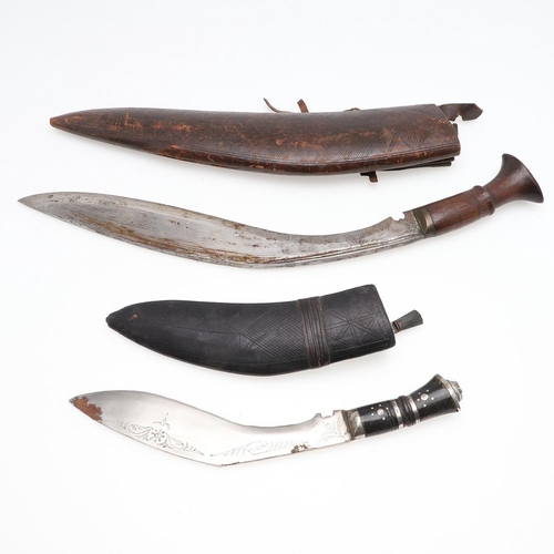 191 - TWO KUKRI KNIVES AND SCABBARDS. A Kukri knife with a 38cm sharpened blade on a wooden handle, in a l... 