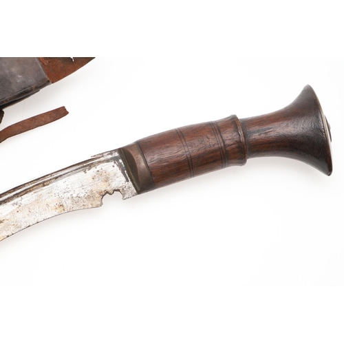 191 - TWO KUKRI KNIVES AND SCABBARDS. A Kukri knife with a 38cm sharpened blade on a wooden handle, in a l... 