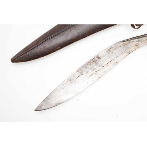 191 - TWO KUKRI KNIVES AND SCABBARDS. A Kukri knife with a 38cm sharpened blade on a wooden handle, in a l... 