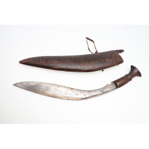 191 - TWO KUKRI KNIVES AND SCABBARDS. A Kukri knife with a 38cm sharpened blade on a wooden handle, in a l... 