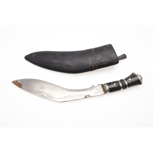 191 - TWO KUKRI KNIVES AND SCABBARDS. A Kukri knife with a 38cm sharpened blade on a wooden handle, in a l... 