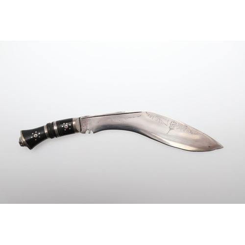 194 - A KUKRI KNIFE WITH BADGE FOR THE 5TH GURKHAS. A Kukri knife with a 22.5cm shaped blade with 'pricked... 