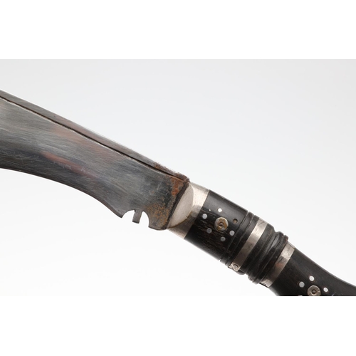 194 - A KUKRI KNIFE WITH BADGE FOR THE 5TH GURKHAS. A Kukri knife with a 22.5cm shaped blade with 'pricked... 