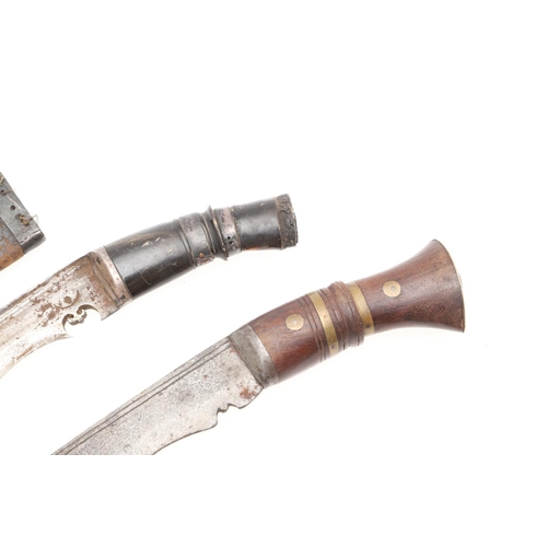 195 - A BROAD BLADE KUKRI KNIFE AND SCABBARD AND ANOTHER SIMILAR. With a 29cm broad shaped blade with shar... 