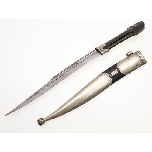 196 - A CAUCASIAN COSSACK KINJAL DAGGER AND SCABBARD. With a 22cm pointed blade of unusual slightly yatagh... 