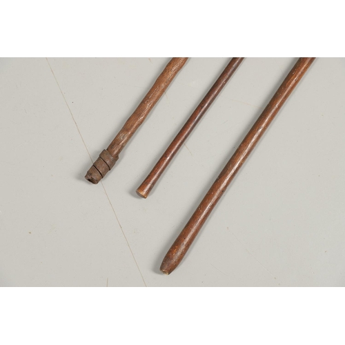 201 - THREE AFRICAN THROWING SPEARS. An African spear with a leaf shaped point on square shaft and wooden ... 