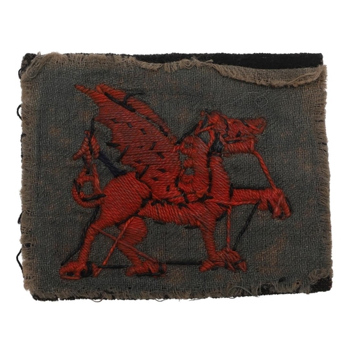 210 - A FIRST WORLD WAR 38TH WELSH DIVISION ARM PATCH. A 38th Division (Welsh) Arm Patch with a red dragon... 