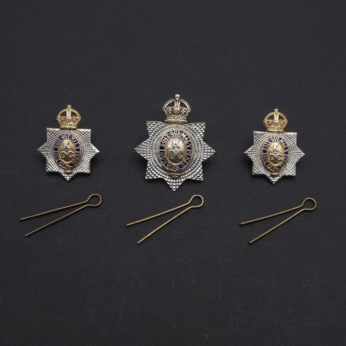 212 - A FINE SET OF SILVER AND ENAMEL CAP AND COLLAR BADGES FOR THE KING's  DRAGOON GUARDS. An Officer's  ... 