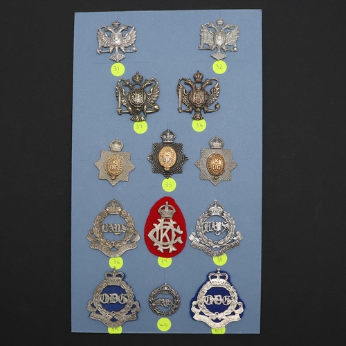 213 - AN EXTENSIVE AND WELL PRESENTED SET OF ARM BADGES FOR THE KING's  DRAGOON GUARDS. A collection of th... 