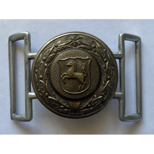 229 - A SECOND WORLD WAR GERMAN BELT BUCKLE AND ANOTHER SIMILAR. A Second World War German Army belt buckl... 