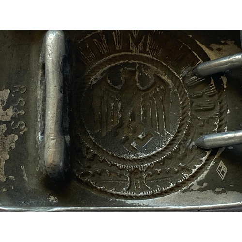 229 - A SECOND WORLD WAR GERMAN BELT BUCKLE AND ANOTHER SIMILAR. A Second World War German Army belt buckl... 