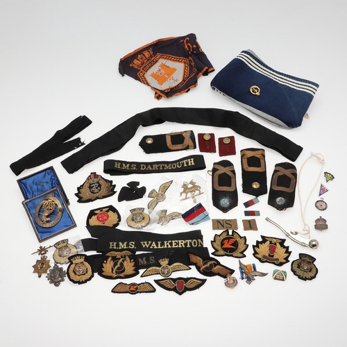 237 - A SCOTTISH CLAN BADGE AND A COLLECTION OF NAVY AND OTHER INSIGNIA. A gilt metal Scottish clan brooch... 