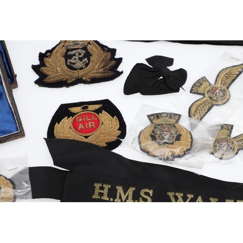 237 - A SCOTTISH CLAN BADGE AND A COLLECTION OF NAVY AND OTHER INSIGNIA. A gilt metal Scottish clan brooch... 