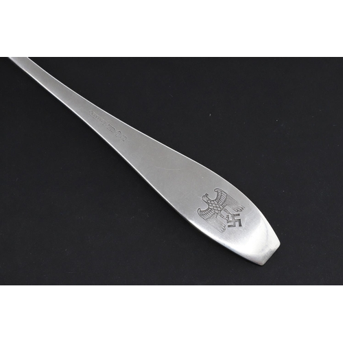 241 - A SECOND WORLD WAR KRIEGSMARINE FISH KNIFE REPUTEDLY FROM THE TIRPITZ. A silver plated fish knife, t... 