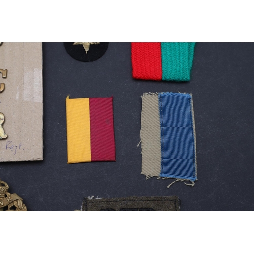 249 - A COLLECTION OF TANK CORPS/REGIMENT BADGES. A First World War 1917 type N.C.O.s' Tank Corps Arm badg... 